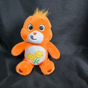 Orange small daisy‎ belly Care Bear